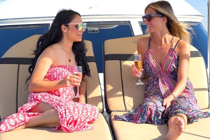 Puerto Vallarta: Private Luxury Yacht Sunset Cruise with Open Bar - Passing the Malecón after dark: city lights from a new angle